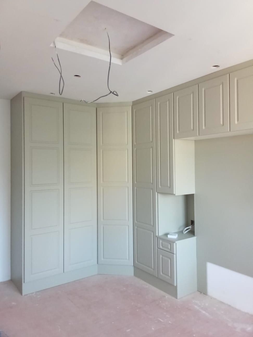 Painted fitted wardrobes built by Kulwant Carpentry